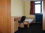 Cliquer ici pour agrandir la photo de la chambre 404 - Le bureau + le lit